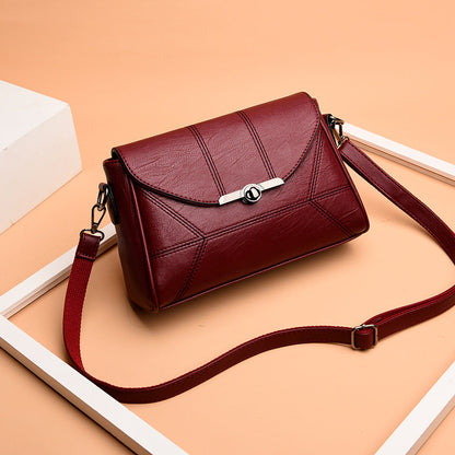 Wholesale women's bags 2024 new middle-aged temperament women's bags genuine leather feel turn lock small square bag shoulder crossbody cross-border 