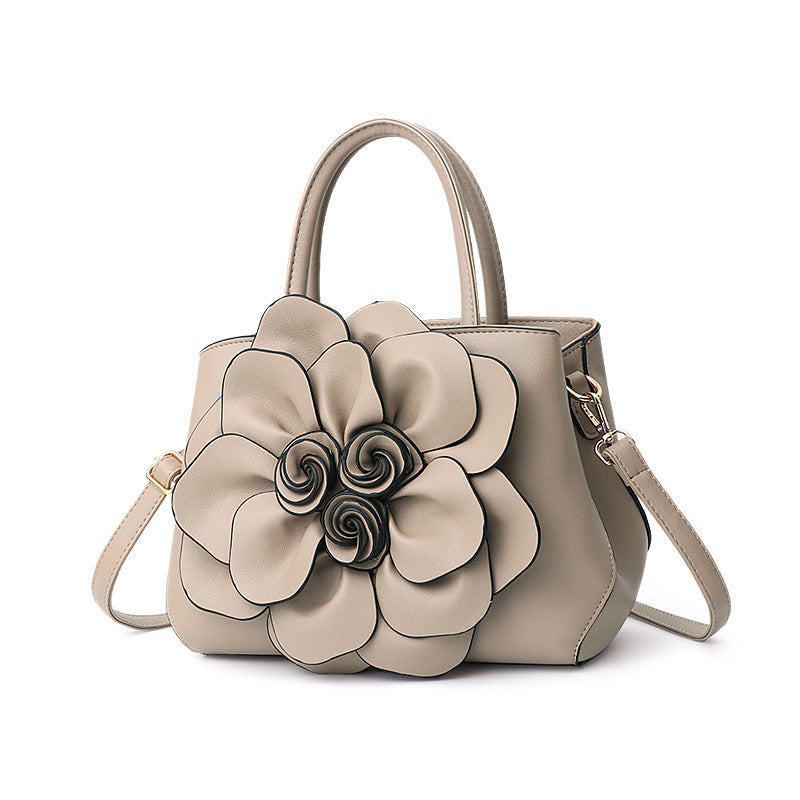 New 2024 autumn and winter new style college style women's bag leather flower handbag shoulder bag cute bag one piece 