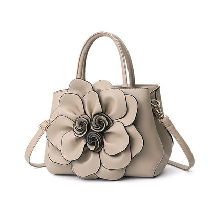 New 2024 autumn and winter new style college style women's bag leather flower handbag shoulder bag cute bag one piece 