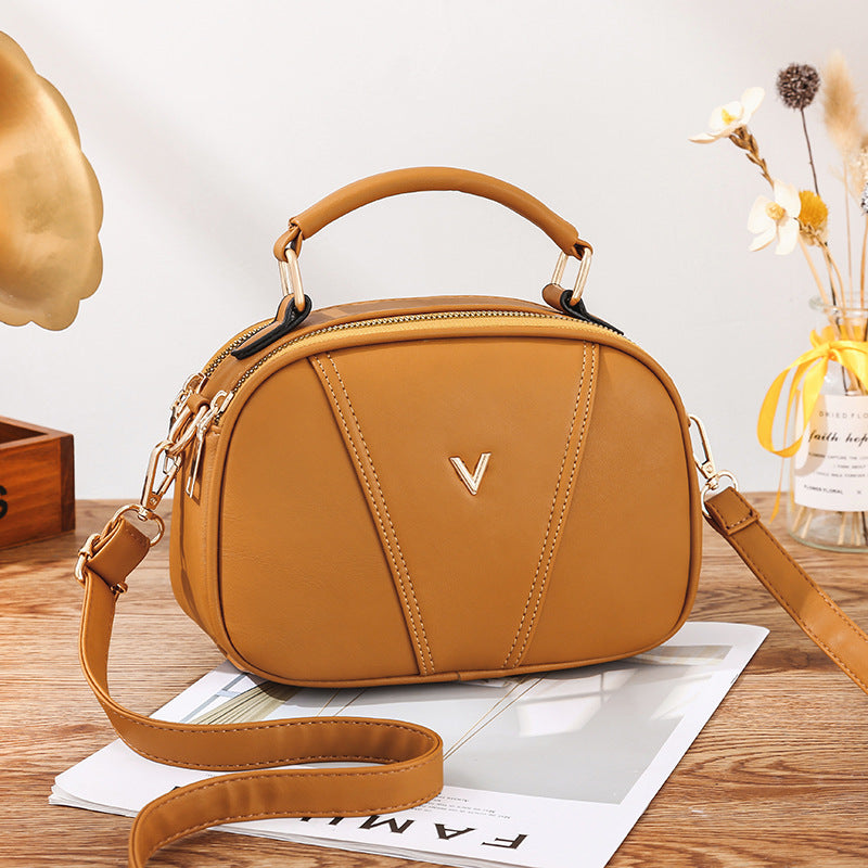 Autumn and winter small bag women's bag 2024 new Korean version shoulder messenger bag fashionable simple solid color small round bag trend 