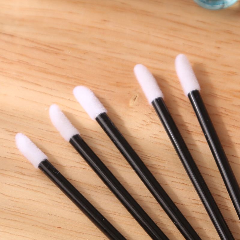 Wholesale beauty makeup tools solid transparent lip brush stick single lipstick makeup brush portable clinker handle makeup brush