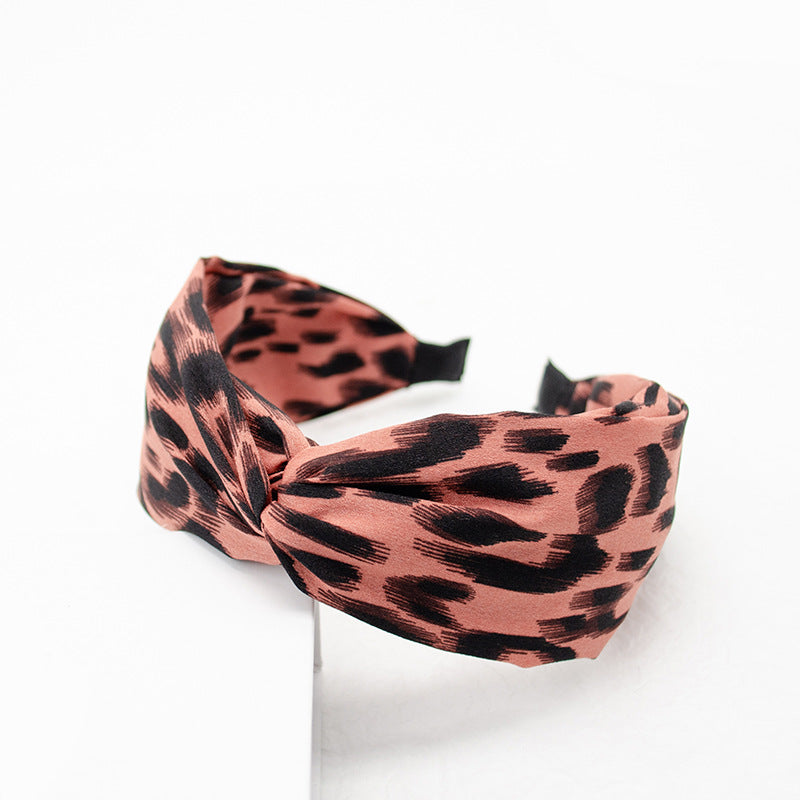 Amazon new style headband women European and American cross knot head buckle leopard spot retro headband hair cave women wholesale