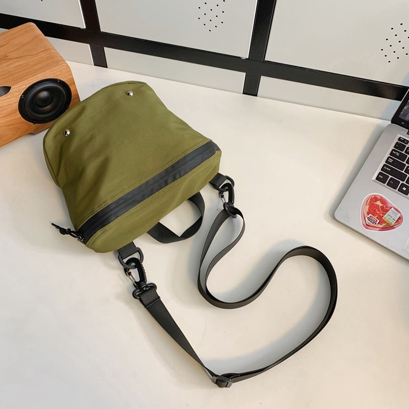 Wholesale trendy brand workwear couple messenger bag casual sports Japanese style student small shoulder bag light sports bucket bag 