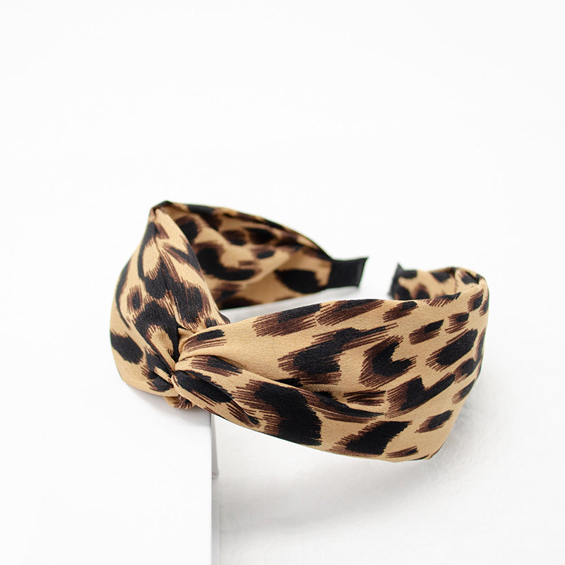 Amazon new style headband women European and American cross knot head buckle leopard spot retro headband hair cave women wholesale