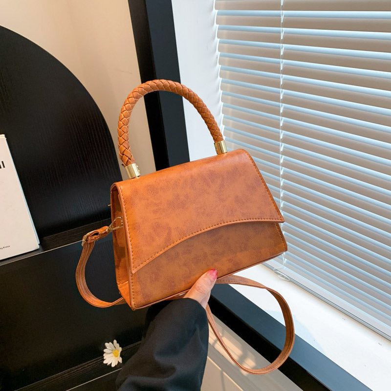 Retro stylish oil leather small square bag 2024 new female hand-held Korean version of the fashion simple crossbody solid color shoulder bag 