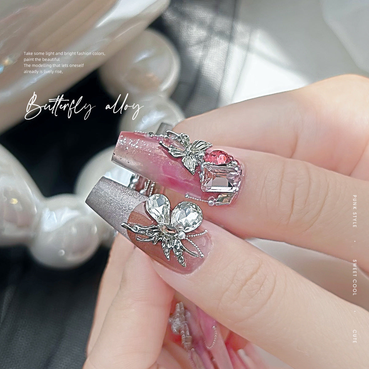 Nail art diamond jewelry wholesale y2k liquid silver alloy butterfly wings hollow mini bow tie nail accessories 