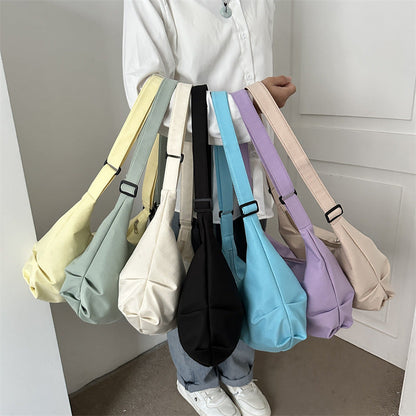 Korean ins large capacity shoulder bag female simple fashion dumpling bag girl student class commuting messenger bag 