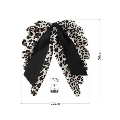 Amazon new product bow hairpin hair accessories women European and American leopard print fabric top clip high ponytail hairpin manufacturers wholesale