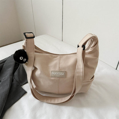 Korean ins large capacity shoulder bag female simple fashion dumpling bag girl student class commuting messenger bag 