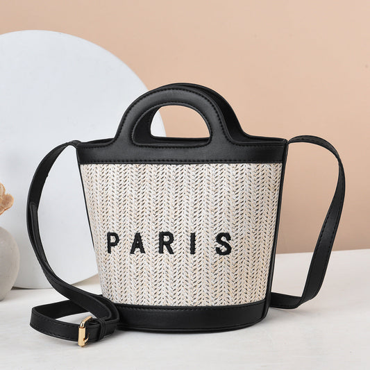 2024 autumn and winter new woven basket bag hand-held straw bag niche raffia hand-held shoulder messenger women's bag 