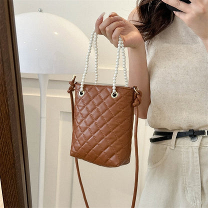 កាបូប Crossbody របស់ស្ត្រី 2024 ម៉ូដ retro ថ្មី កាបូបដាក់ធុងធ្វើដំណើរដែលមានសមត្ថភាពធំ 