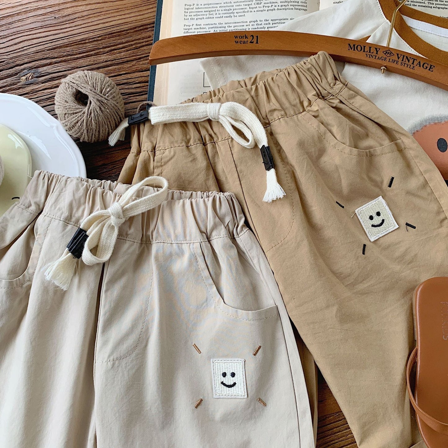 Children's casual pants Bangcheng 2024 summer boys' customized smiley pants new children's sports shorts G0082