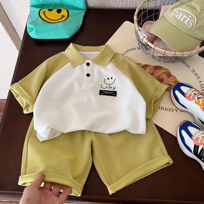 Children's clothing suits 2024 summer new boys cute smiley two-piece children's trendy Polo suits