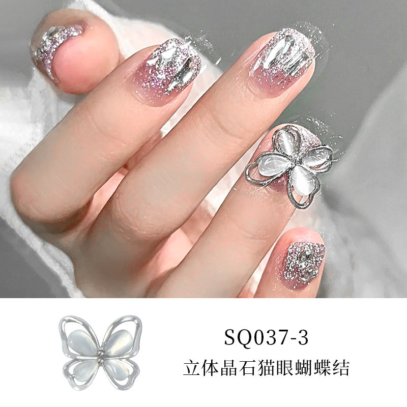 New nail art diamond jewelry flashing bow hollow three-dimensional cat's eye butterfly nail diamond decoration nail art jewelry