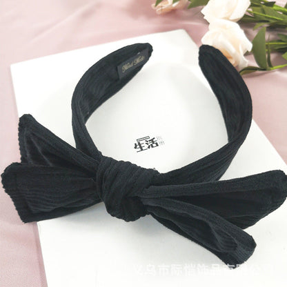 2021 autumn and winter new French big bow headband female European and American retro knotted head buckle velvet headband hair cave female