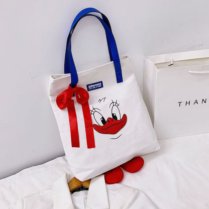 2024 new cute Donald Duck cartoon large capacity student portable tide cloth shoulder new canvas bag female 