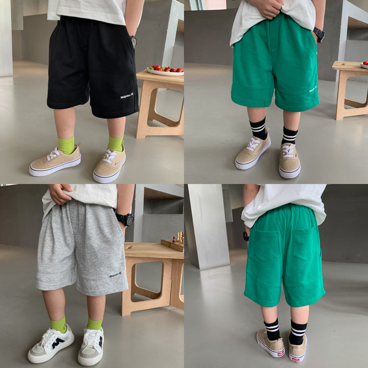 Children's shorts 2023 summer new baby letter stitching sweatpants boys and girls Korean version loose solid color shorts