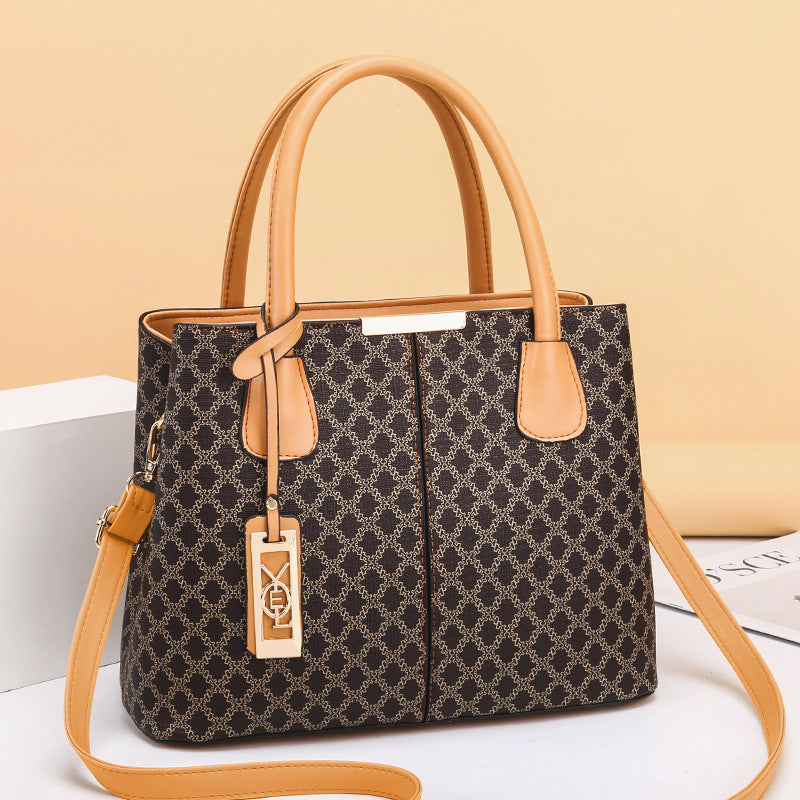 Bags for women 2024 new fashion printed handbags Korean version middle-aged mother bag shoulder messenger bag one piece delivery 