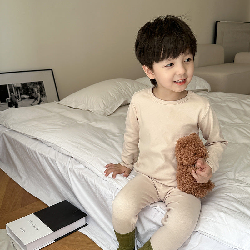 Amo Beibei children's pajamas for boys and girls 2024 spring solid color wool pull-out warm underwear two-piece set