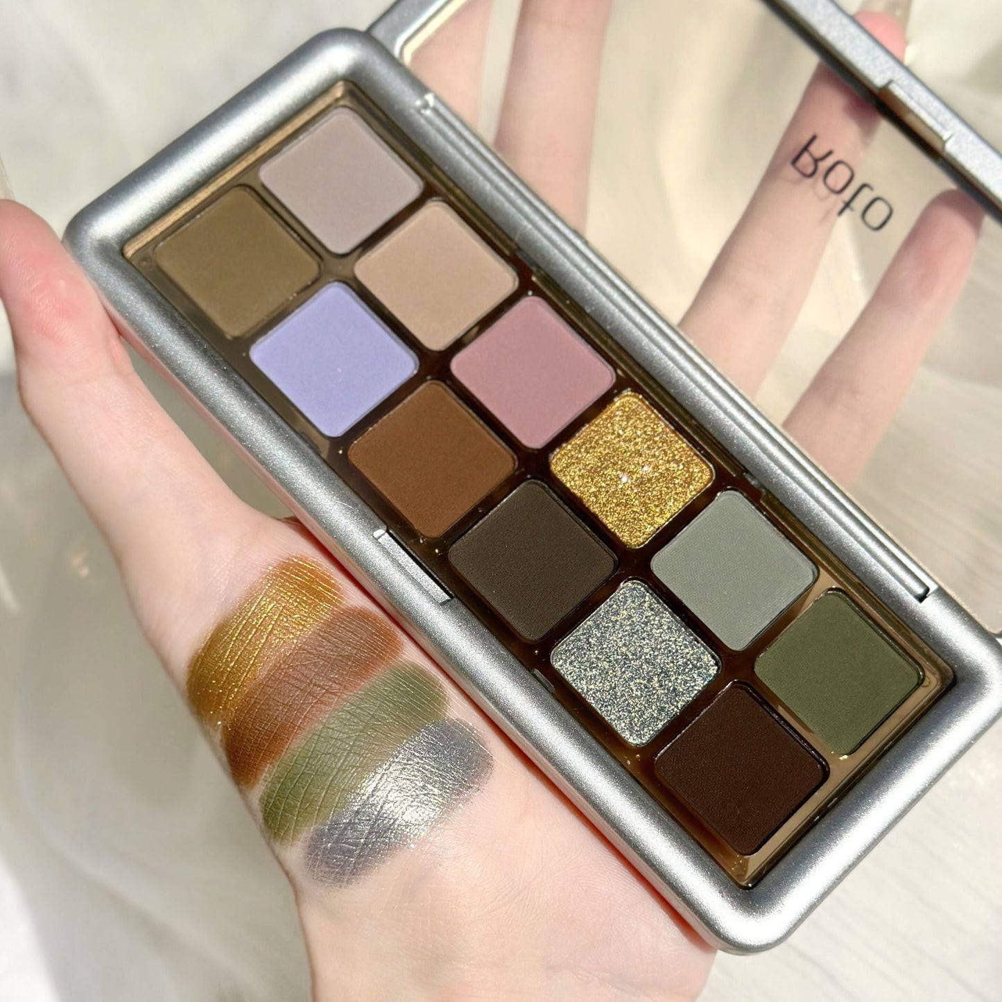 Beauty makeup ROTO cement tray 12 color eye shadow Douyin live broadcast pearlescent flash matte affordable earth color eye shadow wholesale