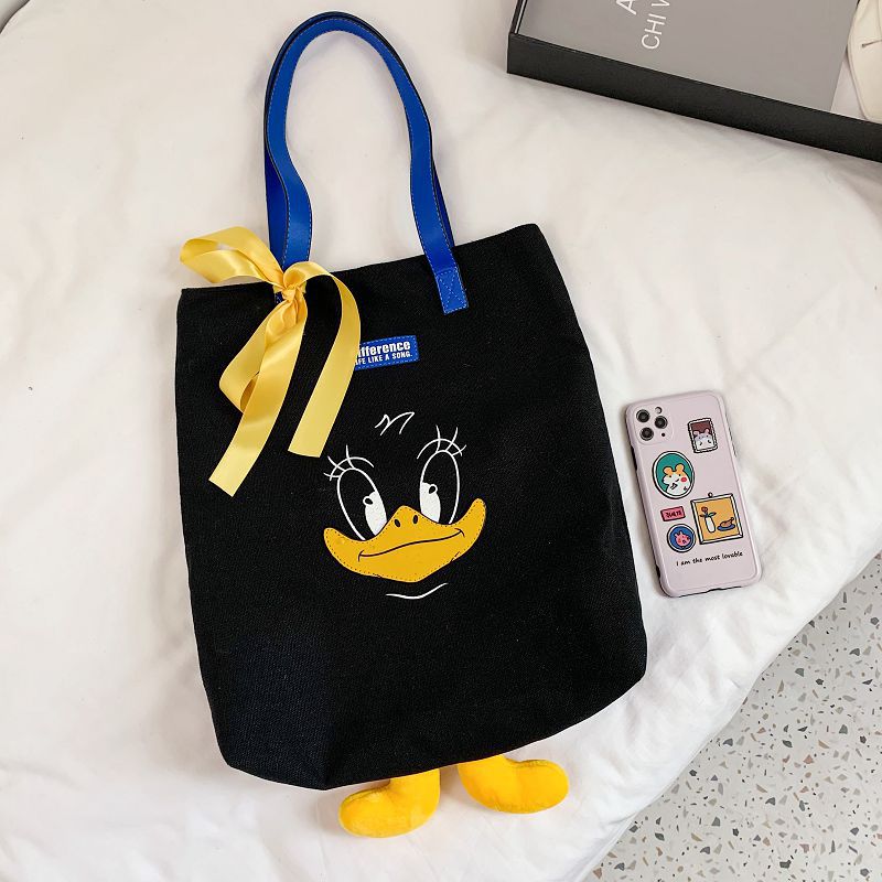 2024 new cute Donald Duck cartoon large capacity student portable tide cloth shoulder new canvas bag female 