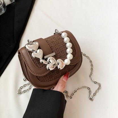 Cross-border bag women 2024 autumn and winter new Korean version fashion candy color ins pearl shoulder crossbody saddle bag 