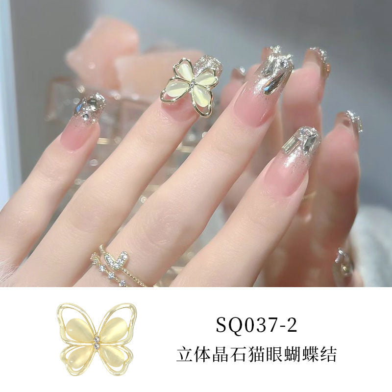 New nail art diamond jewelry flashing bow hollow three-dimensional cat's eye butterfly nail diamond decoration nail art jewelry