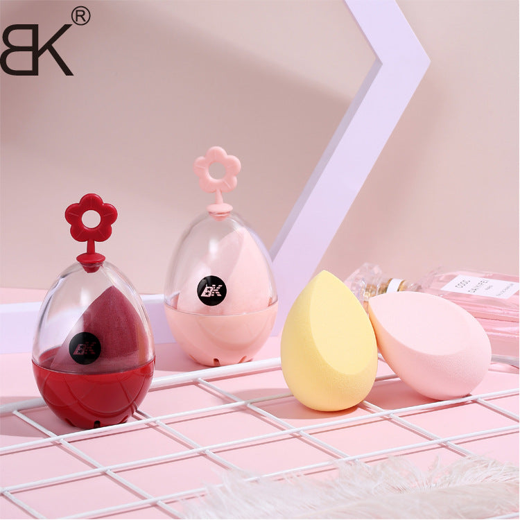 BK beauty makeup egg does not absorb powder. It can be used wet or dry. The makeup egg is super soft and will become a sponge egg when it comes into contact with water.