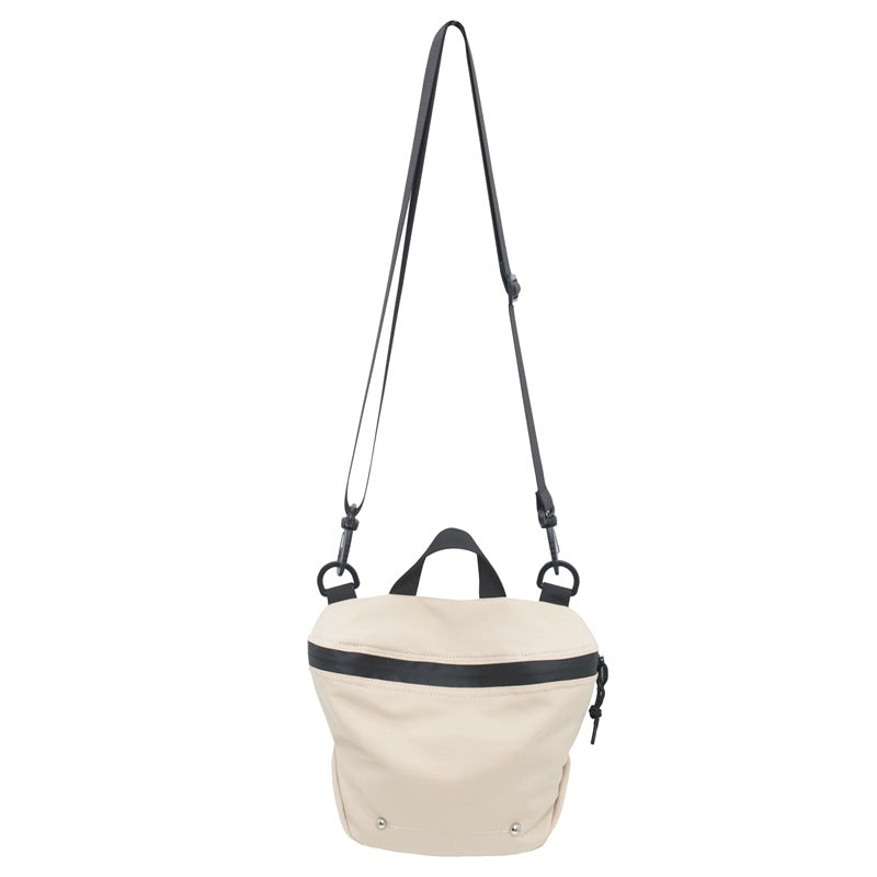 Wholesale trendy brand workwear couple messenger bag casual sports Japanese style student small shoulder bag light sports bucket bag 