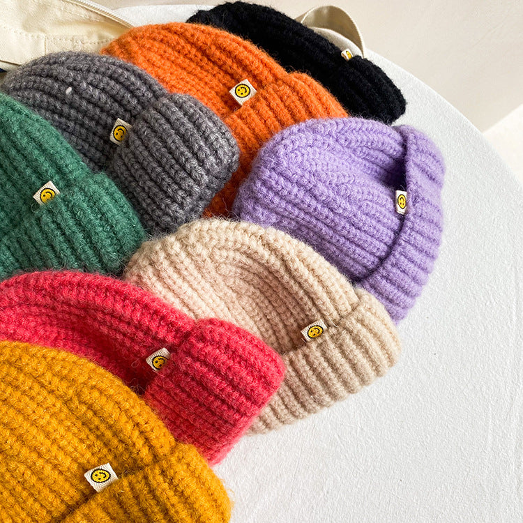 Children's candy-colored hats for boys and girls with fashionable smiley faces knitted hats for babies, casual dome wool hats for 2021 autumn trend