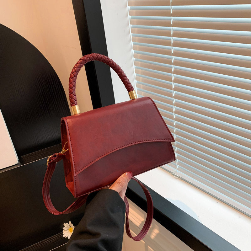 Retro stylish oil leather small square bag 2024 new female hand-held Korean version of the fashion simple crossbody solid color shoulder bag 