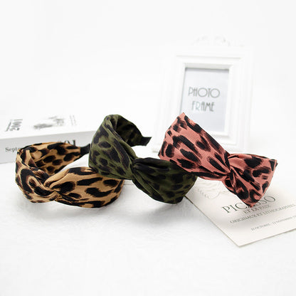 Amazon new style headband women European and American cross knot head buckle leopard spot retro headband hair cave women wholesale