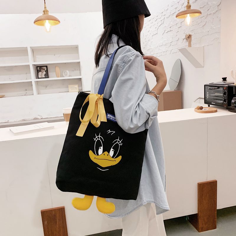 2024 new cute Donald Duck cartoon large capacity student portable tide cloth shoulder new canvas bag female 