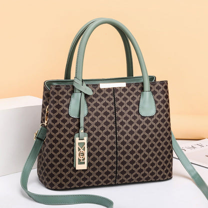 Bags for women 2024 new fashion printed handbags Korean version middle-aged mother bag shoulder messenger bag one piece delivery 