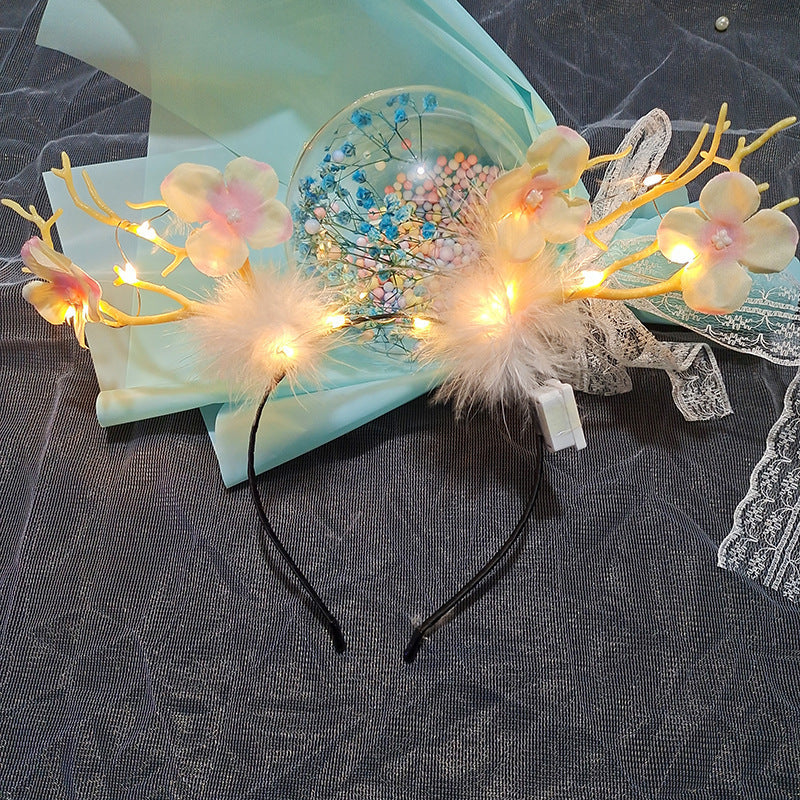 New Year's headdress elk antler headband luminous feather antler beautiful small plum petals Christmas decoration stall night market