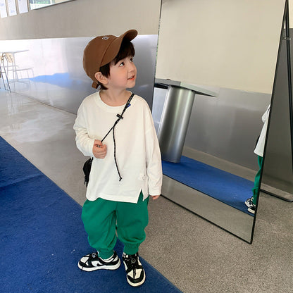 Children's trousers for boys and girls 2023 spring new handsome side label sweatpants baby Korean version loose cuff casual pants