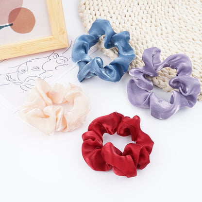 Cross-border supply of large intestine hair band headband for women European and American pearl head flower solid color hair tie ponytail fat intestine hair band