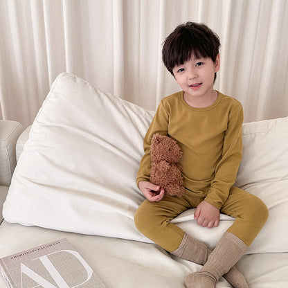 Amo Beibei children's pajamas for boys and girls 2024 spring solid color wool pull-out warm underwear two-piece set