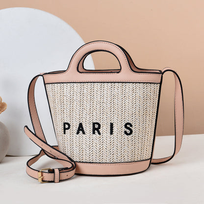 2024 autumn and winter new woven basket bag hand-held straw bag niche raffia hand-held shoulder messenger women's bag 