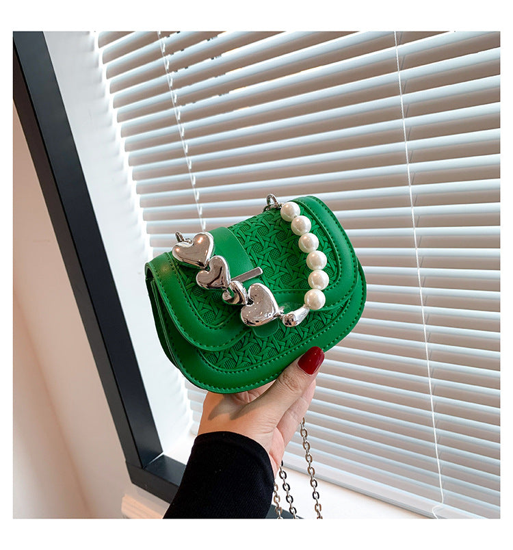 Cross-border bag women 2024 autumn and winter new Korean version fashion candy color ins pearl shoulder crossbody saddle bag 