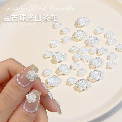 2023 Internet celebrity camellia nail art white aurora three-dimensional flower bow nail accessories diamond decorations wholesale