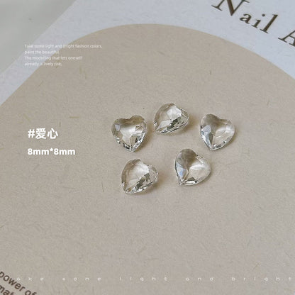 Nail accessories glacier transparent white pointed bottom diamond transparent bottom crooked heart love naked diamond rock sugar diamond nail accessories wholesale