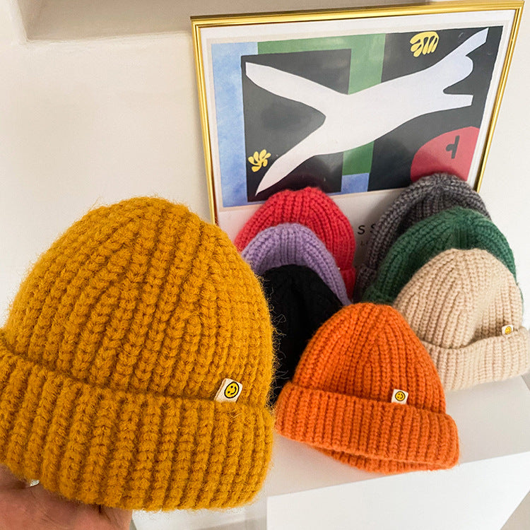 Children's candy-colored hats for boys and girls with fashionable smiley faces knitted hats for babies, casual dome wool hats for 2021 autumn trend