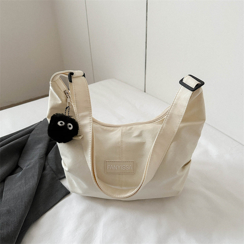 Korean ins large capacity shoulder bag female simple fashion dumpling bag girl student class commuting messenger bag 