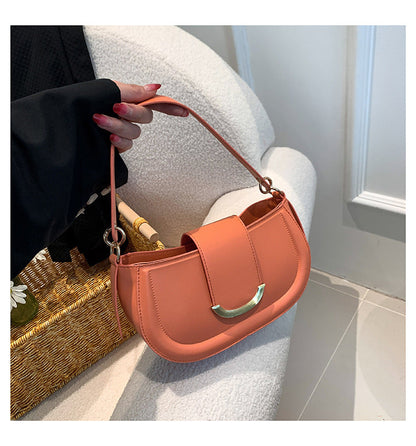 Textured women's shoulder bag 2024 new autumn and winter fashion textured shoulder underarm bag solid color textured crossbody saddle bag 