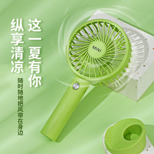 Mini handheld fan office desk mobile phone holder outdoor portable three-speed high wind handheld small fan wholesale 